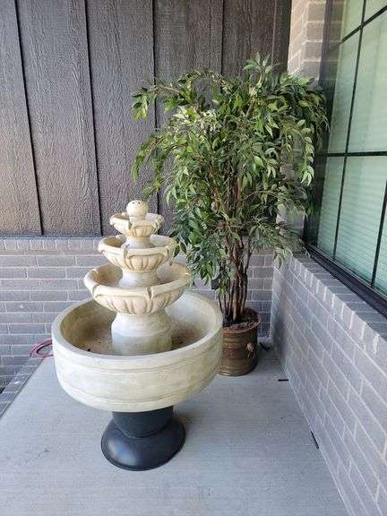 Tiered fountain and ficus tree, on front porch