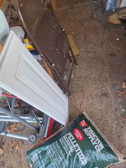Miscellaneous Items Including Feed Bag, Door, and Chair