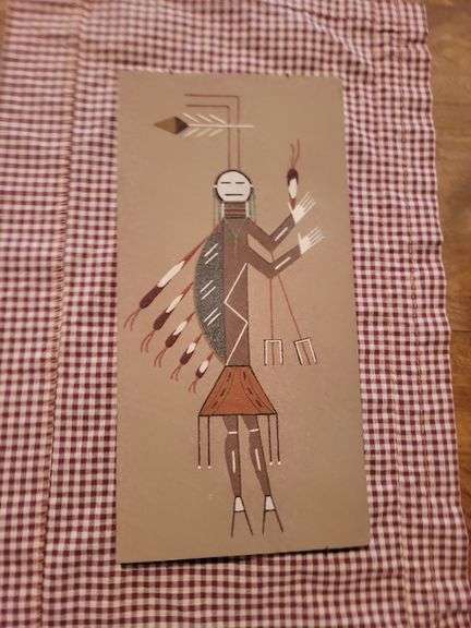 Native American sand art plaque titled "hunchback God"