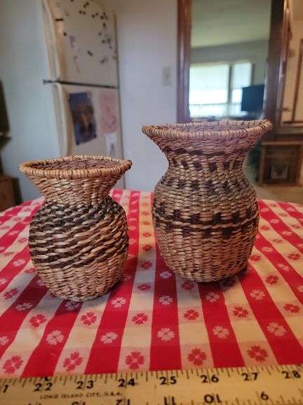 Two small woven grass baskets ultimately 6 in and 5 in tall, vintage