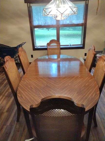 Wooden Dining Table With 1 Leaf And 6 Upholstered Caneback Chairs