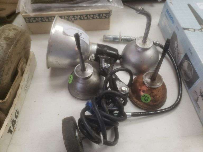 3 Oil Cans And Light
