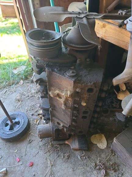 Small Block Chevy (Believed to be 327), Contents Only of Two Shelves of Assorted Engine Parts and One Shelf with Oil Pan