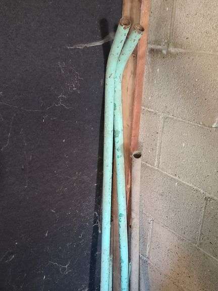 Small Stack of Assorted Metal Tubes