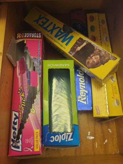 3 Drawers Of Bags, Bakeware, And Knives