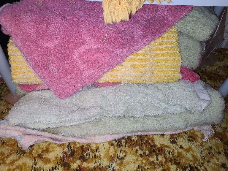 Assorted Blankets And Plastic Shelving Unit