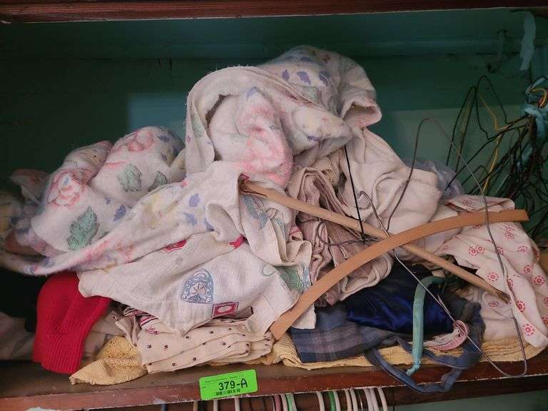 Contents Of Closet, Men's Clothes And Sheets