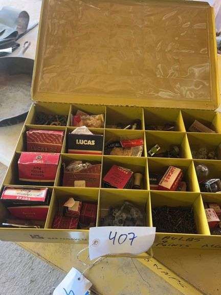 Metal Boxes Containing Bulbs and Ignition Points and an Assortment of Glass Fuses and Shop Hardware