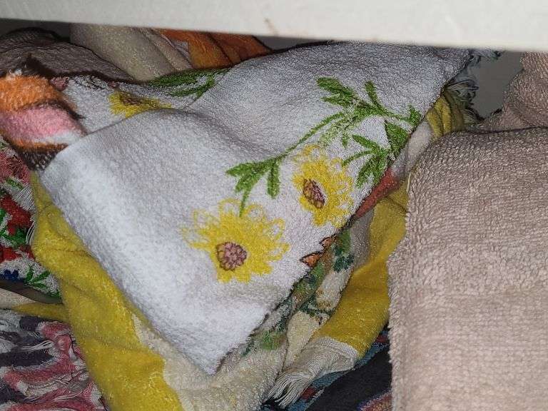 Shelf Of Assorted Towels