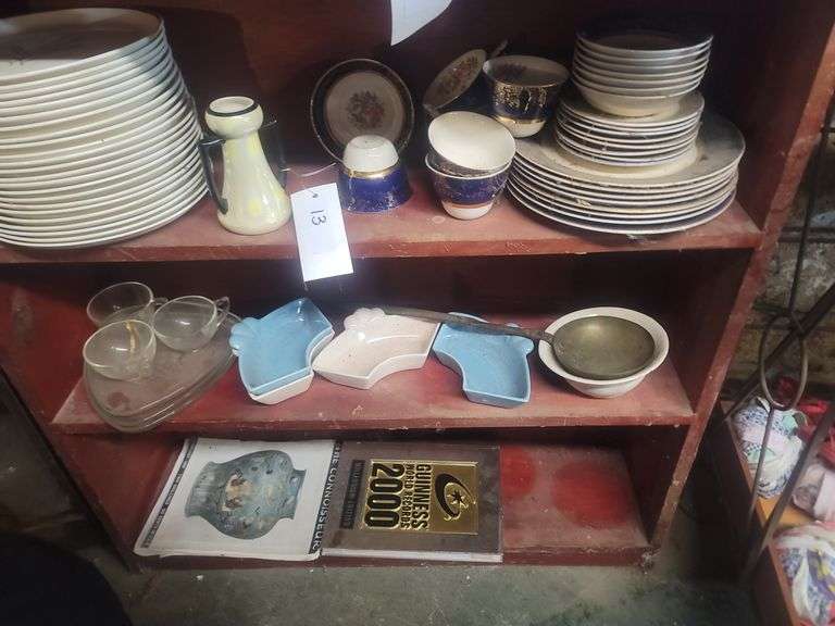 3 Shelves of Plates, Ladle, Books