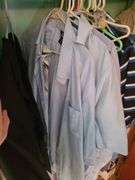 Contents Of Closet, Men's Clothes And Sheets