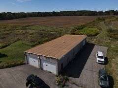 Parcel #2: Brick Home & Outbuildings on 94± Acres