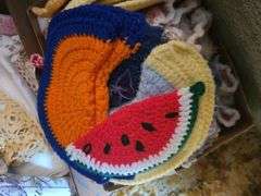 Suitcase And Crocheted Hot Pads