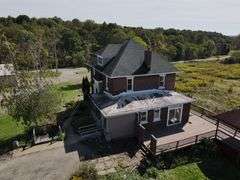 Parcel #2: Brick Home & Outbuildings on 94± Acres
