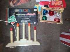 Box Of Christmas Decor, Paper Decorations, Cookie Jar, Lights, And Tree Toppers