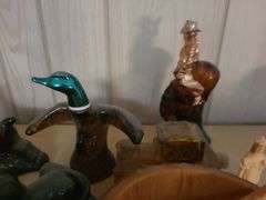 Cologne Bottles, Piggy Bank, And Knife