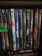 Movie Stand W/ DVD'S & VHS Movies Approx 19" x 7" x 51" Tall