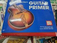 2 Boxes Of Assorted Books, Kid's Books, Guinness World Records, And Guitar Books