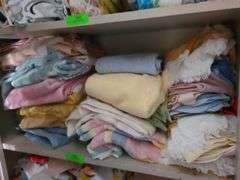Shelf Of Assorted Towels