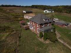 Parcel #2: Brick Home & Outbuildings on 94± Acres