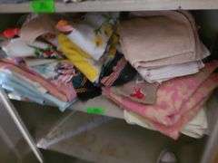 Shelf Of Assorted Towels