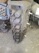 Small Block Chevy Heads, FWD Dodge Transmission and Assorted Engine and Car Parts, Under Workbench