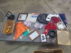 2 Boxes Of Office Supplies, Shelf Liner, Size 6 Crocs, Cash Drawer, Shower Curtain, And Painted Saw Blades