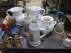 2 Totes Of Pitchers, Steins, And Glasses