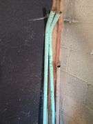 Small Stack of Assorted Metal Tubes