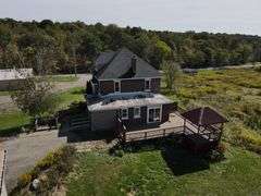 Parcel #2: Brick Home & Outbuildings on 94± Acres