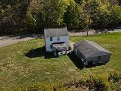 Parcel #3: 2 Story Home & Garage on 5+ Acres