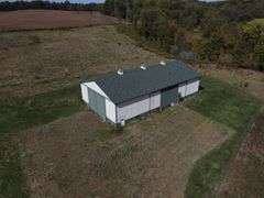 Parcel #2: Brick Home & Outbuildings on 94± Acres