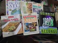 2 Boxes Of Assorted Books, Kid's Books, Guinness World Records, And Guitar Books