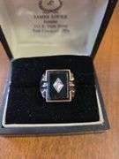 Vintage Men's Ring Featuring A Rectangular Black Onyx Stone With A Diamond Accent In A 10K Yellow Gold (Approx Size 10k)