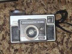 Polaroid Camera, Kodak Instant Camera, Kodak Instamatic, Magicube, And Kodak Negative Film