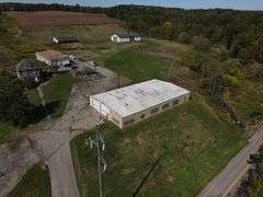 Parcel #2: Brick Home & Outbuildings on 94± Acres