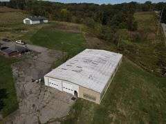 Parcel #2: Brick Home & Outbuildings on 94± Acres