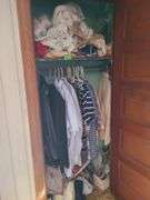 Contents Of Closet, Men's Clothes And Sheets