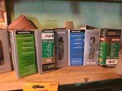 Partial Bottles Of Bug Killer, Paint, Nails, Screws, And Nuts