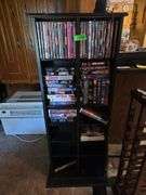 Movie Stand W/ DVD'S & VHS Movies Approx 19" x 7" x 51" Tall