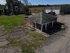 Parcel #2: Brick Home & Outbuildings on 94± Acres