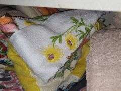 Shelf Of Assorted Towels