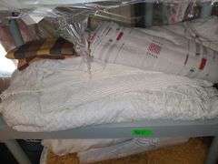 Assorted Blankets And Plastic Shelving Unit