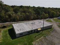 Parcel #2: Brick Home & Outbuildings on 94± Acres