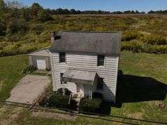 Parcel #3: 2 Story Home & Garage on 5+ Acres