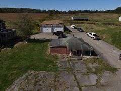 Parcel #2: Brick Home & Outbuildings on 94± Acres