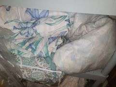 Assorted Blankets And Plastic Shelving Unit