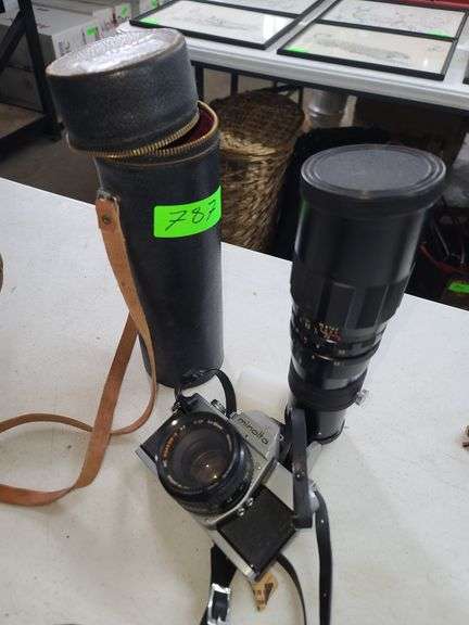 Minolta SrT101 35mm Camera and Soligor Telephoto Lens with Case