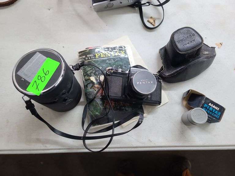 Pentax 35mm Camera, with Case, Empty Lens Case, Magazine, and Manual