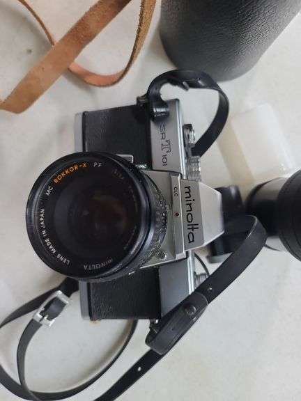 Minolta SrT101 35mm Camera and Soligor Telephoto Lens with Case